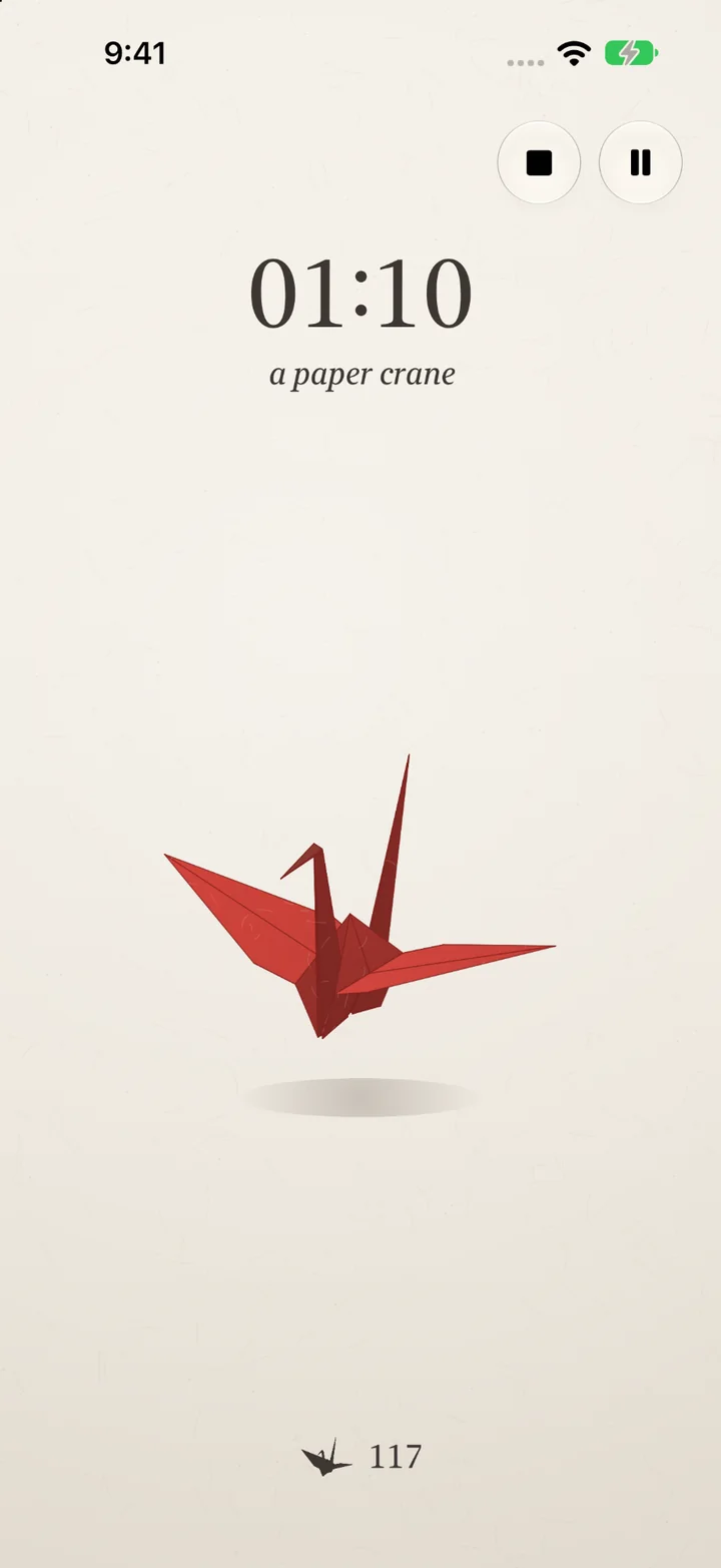 The Paper Crane theme: a red origami crane floating on cream paper under a 01:10 countdown, with a count of 117 cranes at the bottom.
